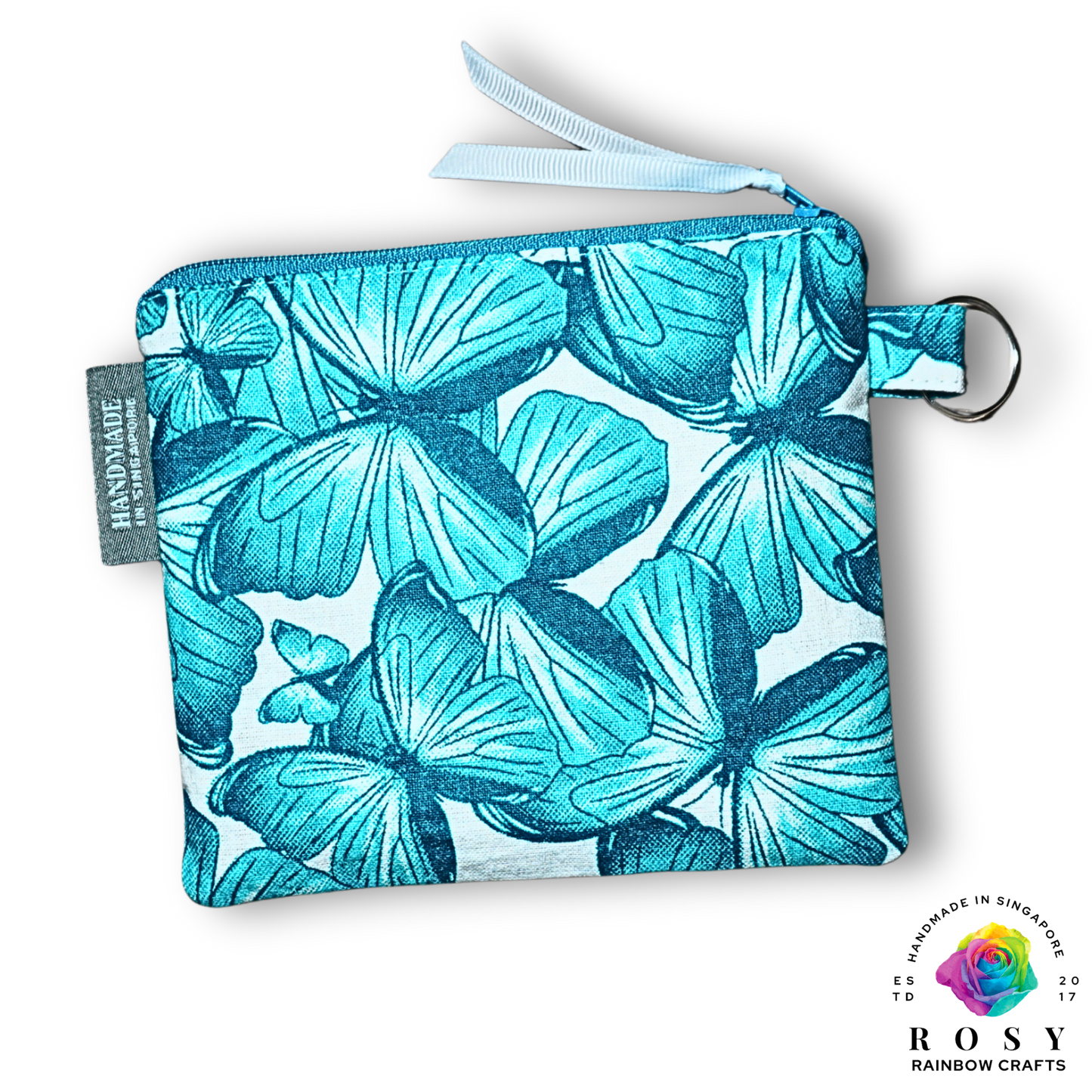 Turquoise butterfly printed pouch with a visible brand logo on a white background